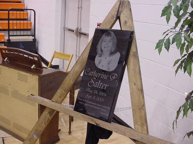 A slate memorial for Cathy Salter Memorial being displayed at Wellsville High School Class Day